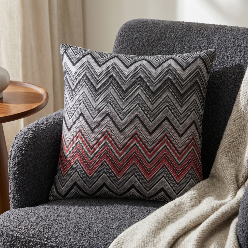 Coussin décoratif rythme zigzag anthracite et rouge