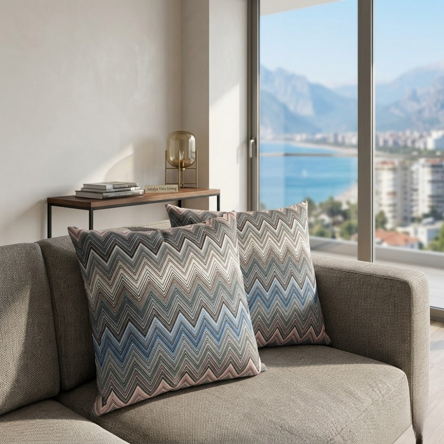 Coussin décoratif à motif zigzag bleu et gris