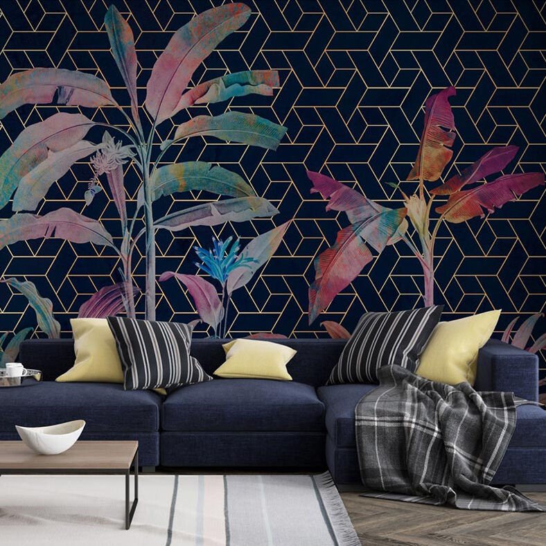 Papier peint feuillages tropicaux géométriques sur fond bleu marine
