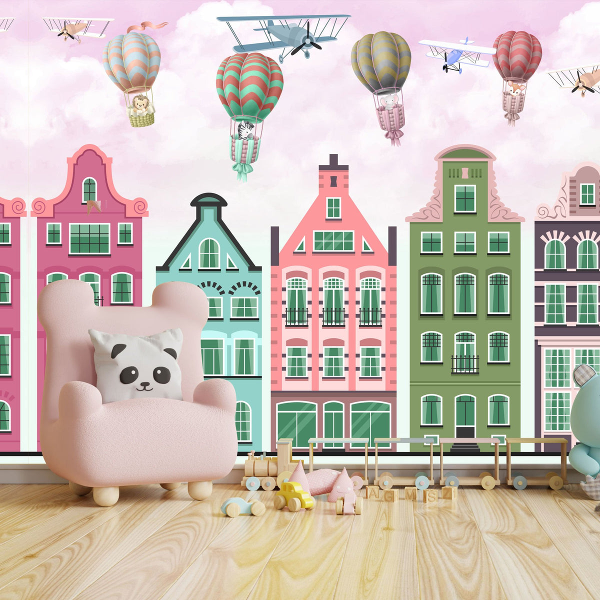 Papier peint immeubles colorés et montgolfières sur fond rose