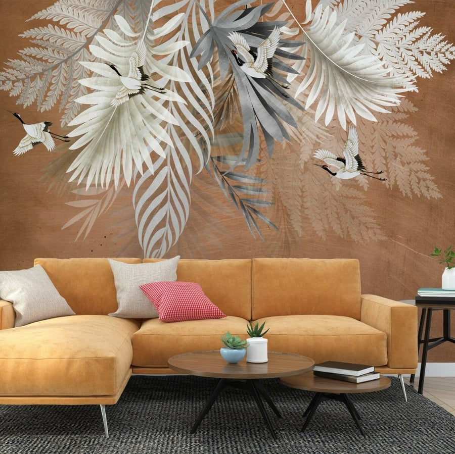 Papier peint grues parmi les feuillages sur fond terre cuite